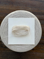 Load image into Gallery viewer, Consinee 70 Mercerized Wool 30 Cashmere · 2/26nm · Heathered Oatmeal · Cone Yarn
