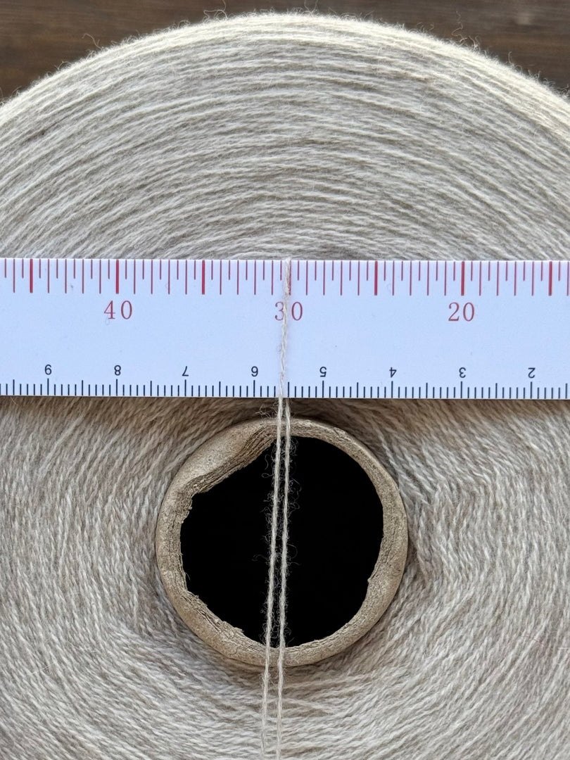 Consinee 70 Mercerized Wool 30 Cashmere · 2/26nm · Heathered Oatmeal · Cone Yarn