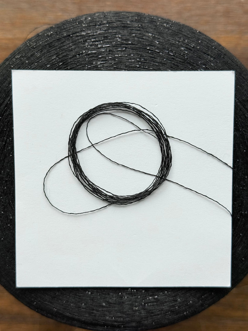 Olivo Sarilux 47 Viscose 41 Polyester 12 Metallized Fibre · Metallic Carry-Along Cone Yarn