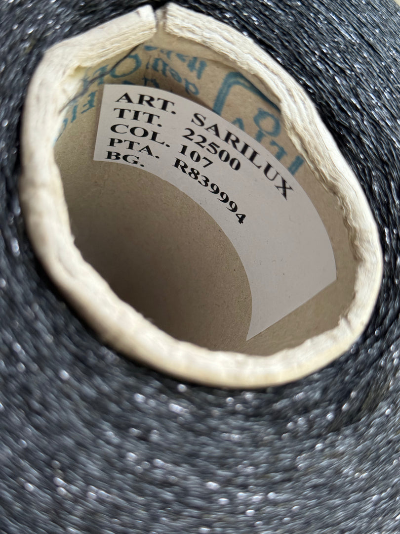 Olivo Sarilux 47 Viscose 41 Polyester 12 Metallized Fibre · Metallic Carry-Along Cone Yarn