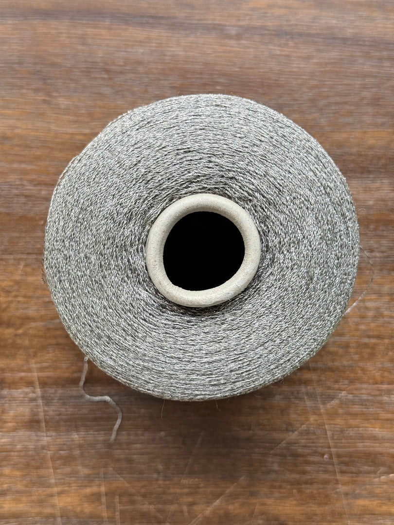 CTF Lustro Metallic Carry-Along Cone Yarn · 1/11,700nm · Warm Silver