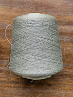 Load image into Gallery viewer, CTF Lustro Metallic Carry-Along Cone Yarn · 1/11,700nm · Warm Silver

