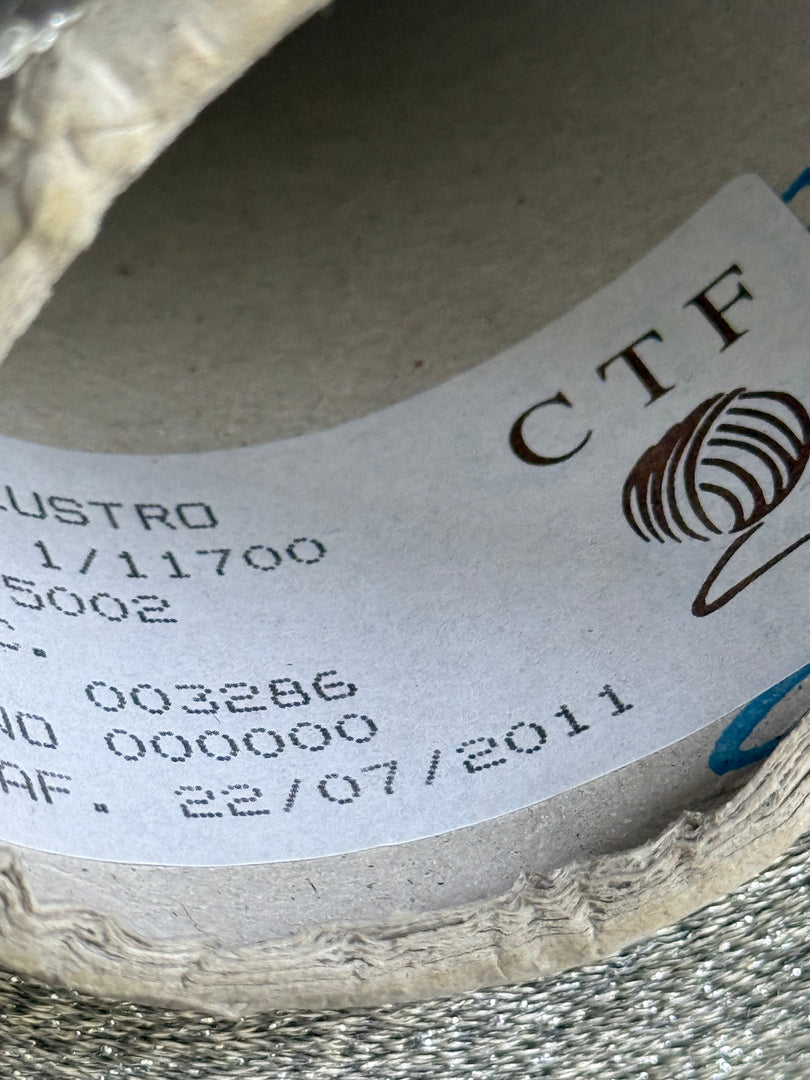 CTF Lustro Metallic Carry-Along Cone Yarn · 1/11,700nm · Warm Silver