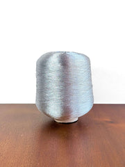 Olivo Makó Cotton Blend Metallic Carry-along Cone Yarn