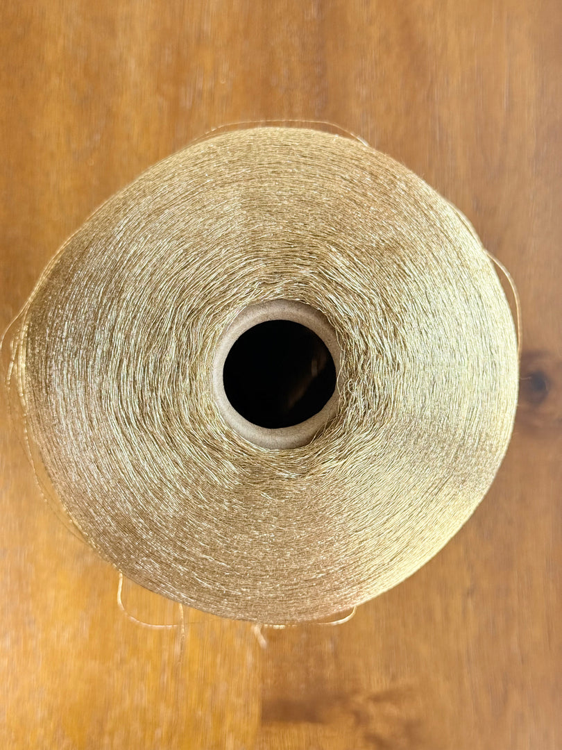 Olivo Makó Cotton Blend Metallic Carry-along Cone Yarn