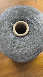 Load and play video in Gallery viewer, Olivo Saridance Viscose Polyester Glitter Cone Yarn · 1/22.5Nm · Italy